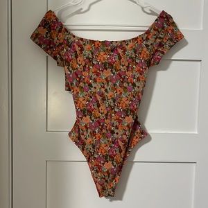 LUSH floral bodysuit size small